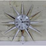 A retro Metamec chromed sunburst clock, diam. 58cm. Condition - currently running however not sold