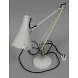 A Herbert Terry & Sons white anglepoise lamp.