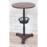 A George IV rosewood occasional table with tri-form platform base and turned pillar divided by a