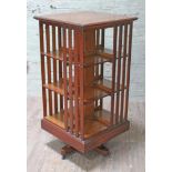 An oak revolving bookcase circa 1900, height 123cm.