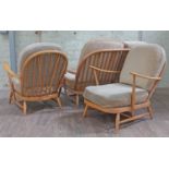 A Ercol light beech three piece suite.