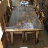 An aged oak country kitchen table with single drawer and four chairs, length 168cm, depth 84cm &