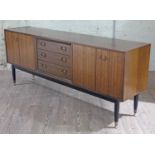 A G-Plan Tola and black sideboard, height 77cm, width 191cm, depth 43cm.