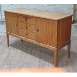 A Gordon Russell Broadway walnut sideboard, length 142cm, depth 49cm & height 86cm.