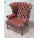 A Chesterfield wing back leather chair, width 82cm, depth 70cm & height 98cm.