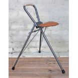 A shooting stick/folding tripod stool with stitched leather effect seat by Hill-Rest.