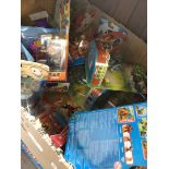 A box of collectable Skylanders, Pokemon and Yo-Kai toys