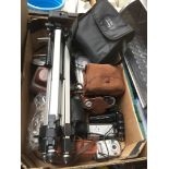 A box containing cameras and accessories