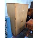 A Younger teak wardrobe with Kofod Larsen style handles.