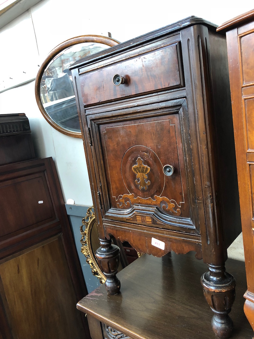 A 1930s bedside cabinet.