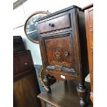 A 1930s bedside cabinet.