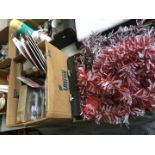 Box of Christmas decorations and box of tinsel