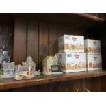 Eight Lilliput Lane cottages - four in boxes