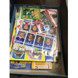 A box of football stickers and albums