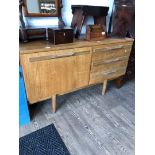 A teak sideboard, length 124cm.