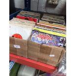 2 boxes of 45s rock, 60's, etc