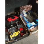 2 boxes of model cars