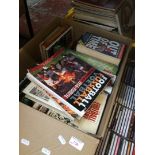 Box containing appx 50 football related books