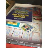 A box of football albums cards and stickers