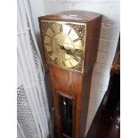 An oak veneered granddaughter clock, the brass dial inscribed 'Hen. Deykin Worcester N.1310