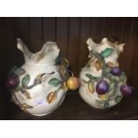 Pair of fruit encrusted pottery vases