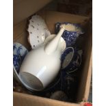 A box containing mainly jugs, cups, pottery and crockery