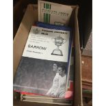 A box of 50's - 60's football programmes