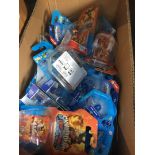 A box of boxed Skylander Trap Team figures