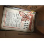 A box of Speedway programmes