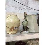 Pottery vase and a table lamp