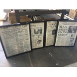 Four framed notable newspaper pages