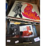 A box of records and CDs