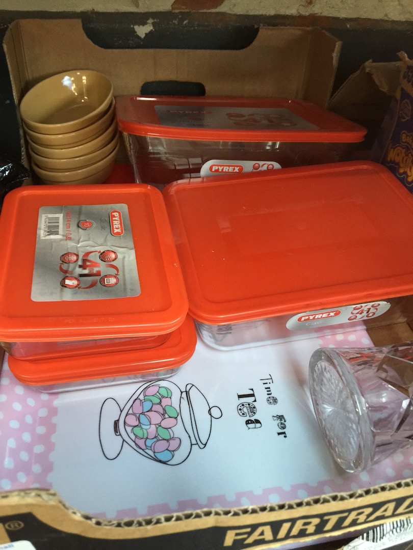 A box containing kitchenware including Pyrex