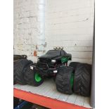 A RC car with spare wheels ( no remote )