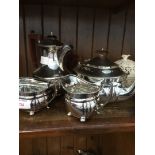 A four piece silver plated tea set.