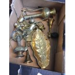 A box of brassware