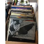 A box of 80's rock records