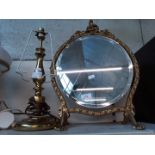 Swivel mirror and brass lamp