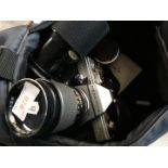 A bag with camera and lenses