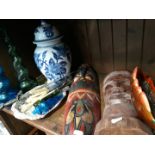 Shelf of items inc. carved wood, blue vase and cover, glass etc.