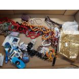 A box of mixed costume jewellery, magnets etc