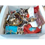 Large box of costume jewellery and oriental purses