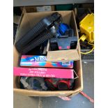 A box of misc items including a portable gas stove, etc