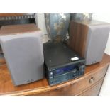 An Onkyo CR-725DAB amp CD and radio with a pair of Monitor Audio Bronze BR1 speakers.