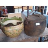 A cast metal Dutch oven type pot and a Doulton stoneware jardiniere.