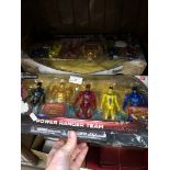 3 boxes of Power Rangers figures