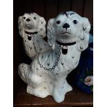 A pair of Staffordshire pot dogs