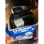 A box with projector and other items, etc