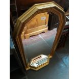 A modern mirror, length 89cm.