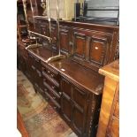 An oak sideboard with cupboard top